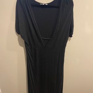 Maxi dress with plunging neckline.  Great with pretty bralette or tank top under